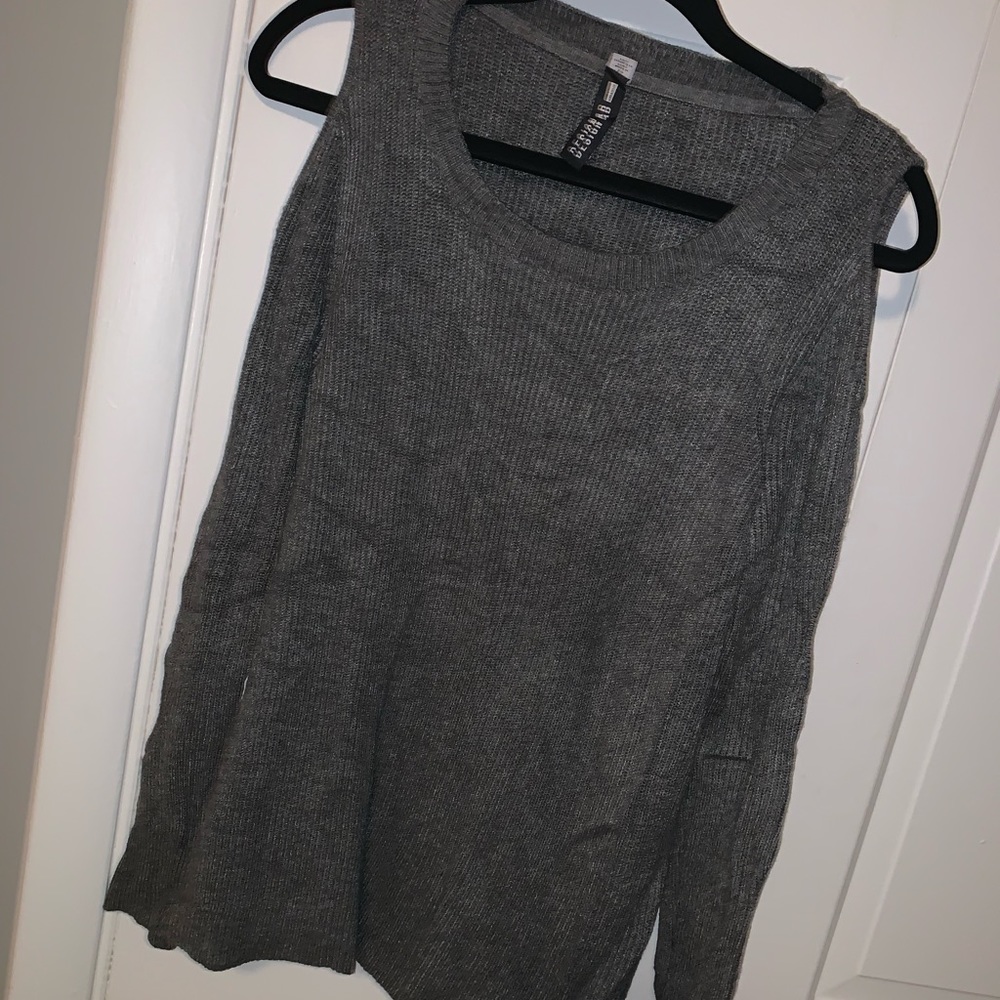 Sweater with cut out sleeves